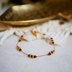 bracelet cordon fil orange et pierres