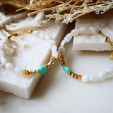 Bracelet Adhya pierre de lune amazonite breloques dorées
